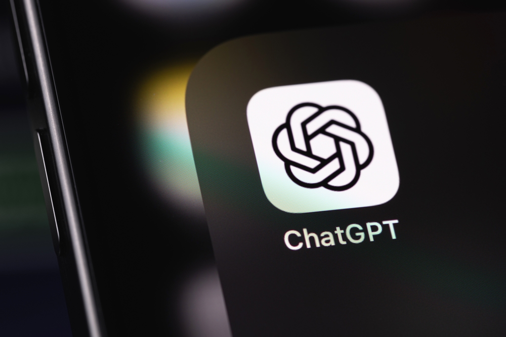 Close-up of the ChatGPT app icon and name on a smartphone screen.